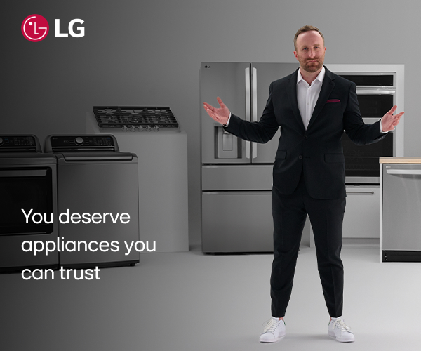 Man posing in front of LG appliances
